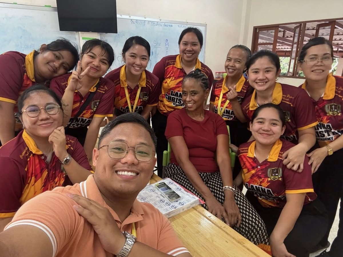Selfie with the Lanna Christian Academy teachers in maroon polos